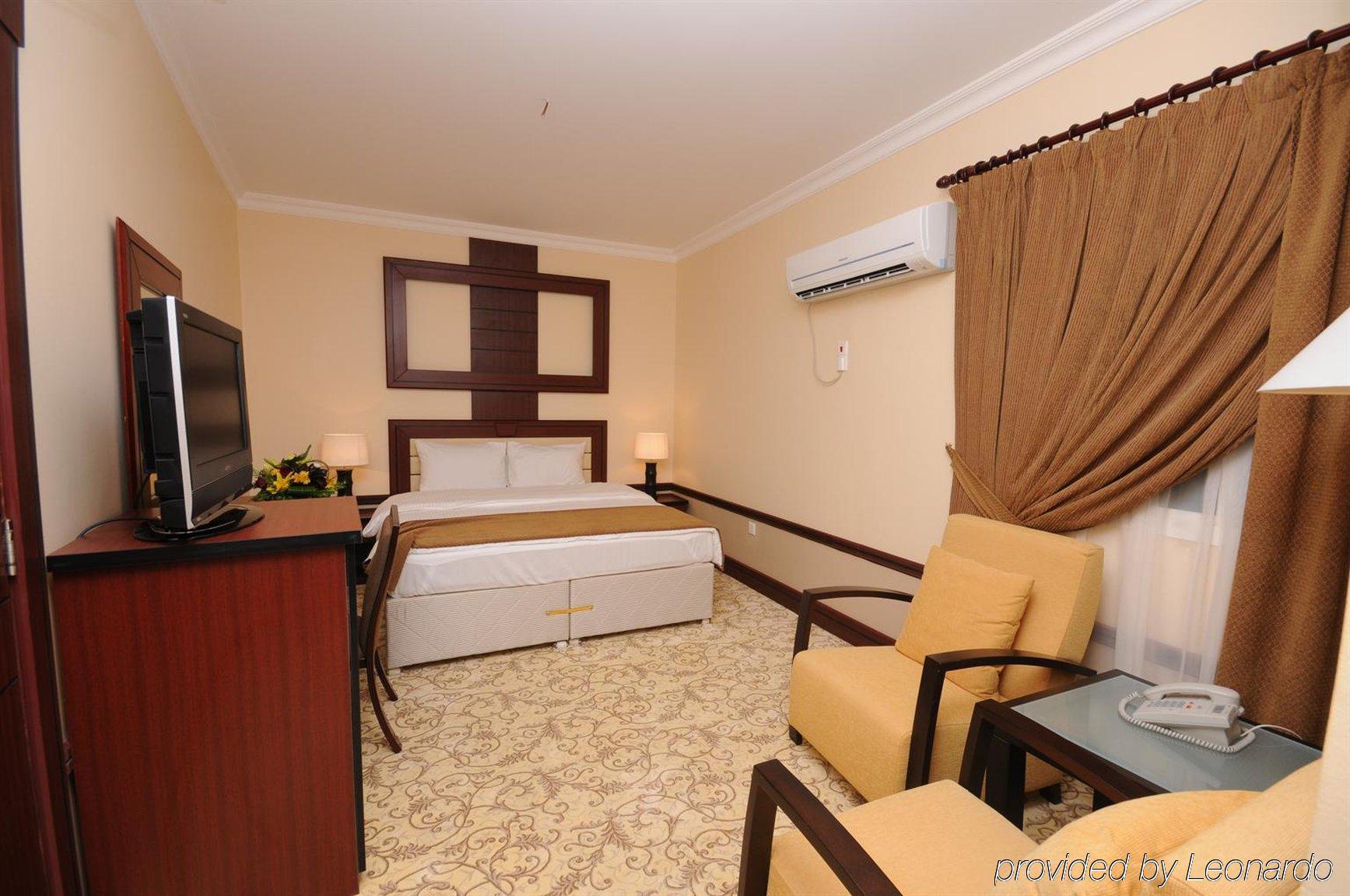 La Villa Palace Hotel Doha Chambre photo